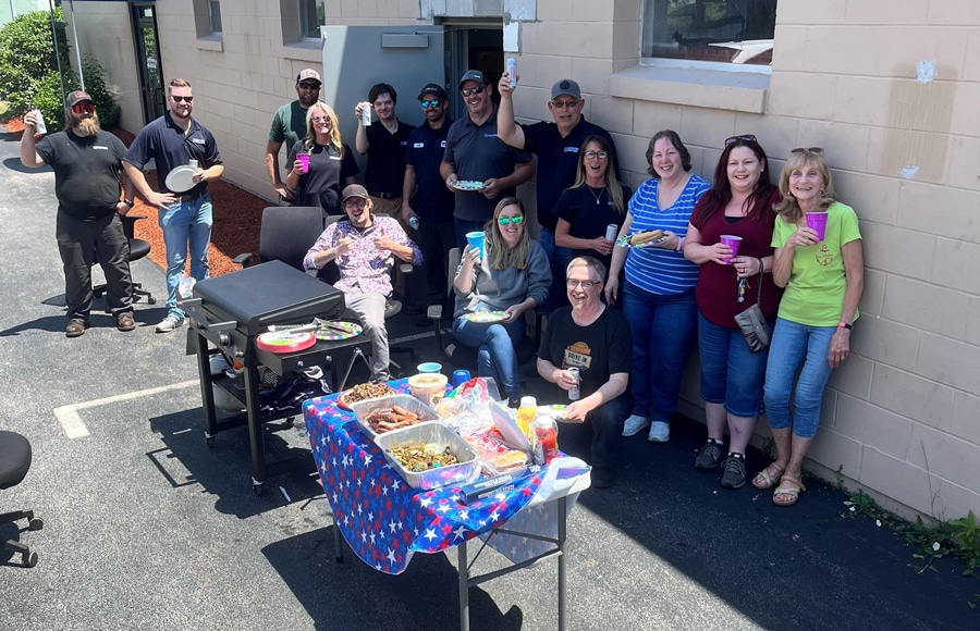 COMAIRCO employees posing for a team photo 